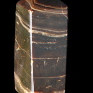 Chocolate Calcite obelisk 94*32*31mm 218g in sunlight - Rocks and Things Store