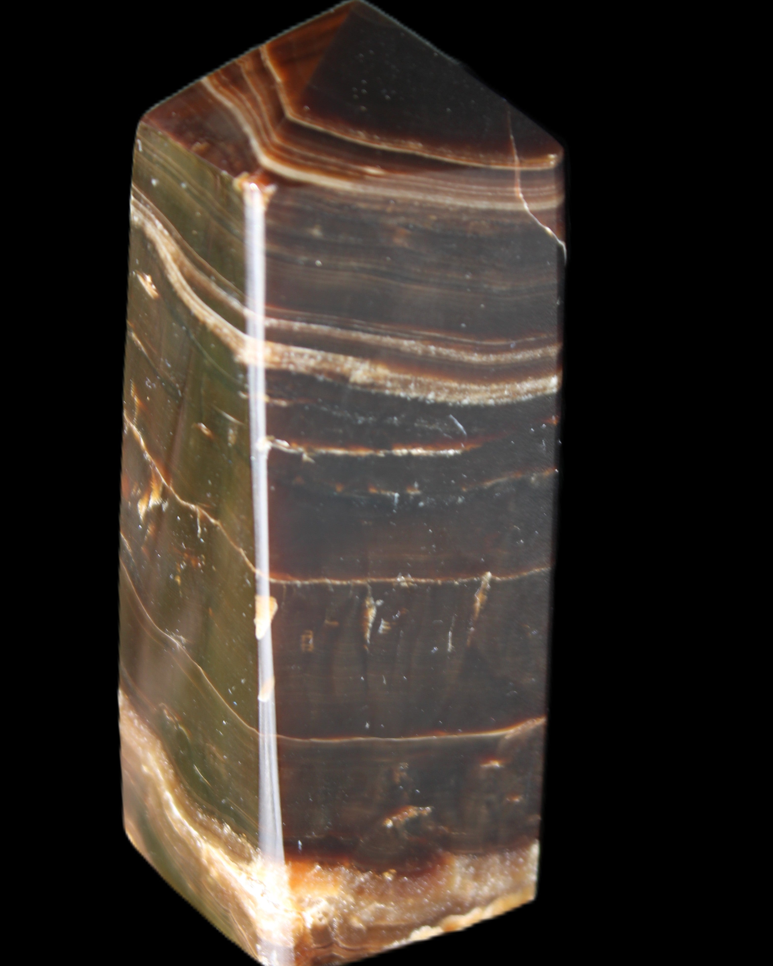 Chocolate Calcite obelisk 94*32*31mm 218g in sunlight - Rocks and Things Store