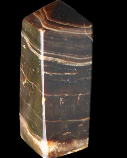 Chocolate Calcite obelisk 94*32*31mm 218g in sunlight - Rocks and Things Store