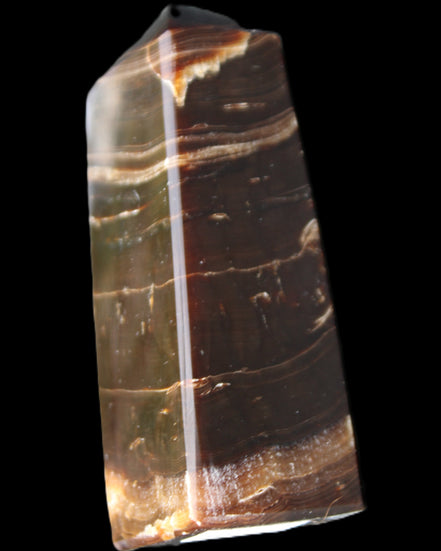 Chocolate Calcite obelisk 94*32*31mm 218g in sunlight - Rocks and Things Store