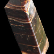 Chocolate Calcite obelisk 94*32*31mm 218g in sunlight - Rocks and Things Store