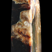 Chocolate Calcite obelisk 95*31*31mm 203g in sunlight - Rocks and Things Store