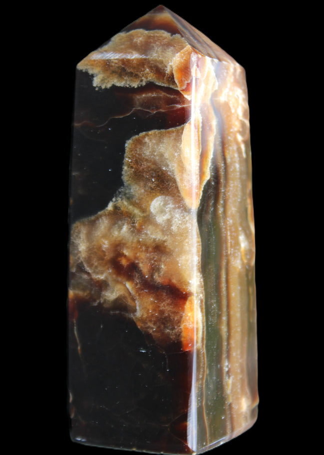 Chocolate Calcite obelisk 95*31*31mm 203g in sunlight - Rocks and Things Store