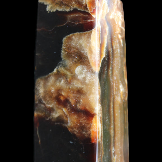 Chocolate Calcite obelisk 95*31*31mm 203g in sunlight - Rocks and Things Store