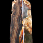 Chocolate Calcite obelisk 95*31*31mm 203g in sunlight - Rocks and Things Store