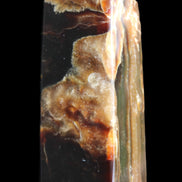Chocolate Calcite obelisk 95*31*31mm 203g in sunlight - Rocks and Things Store