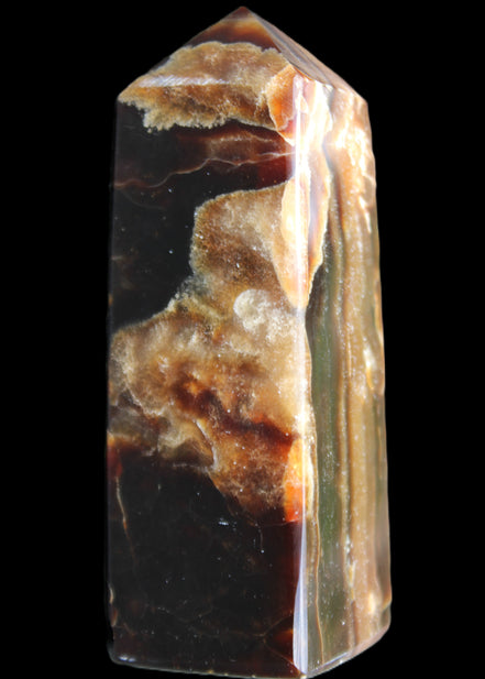 Chocolate Calcite obelisk 95*31*31mm 203g in sunlight - Rocks and Things Store