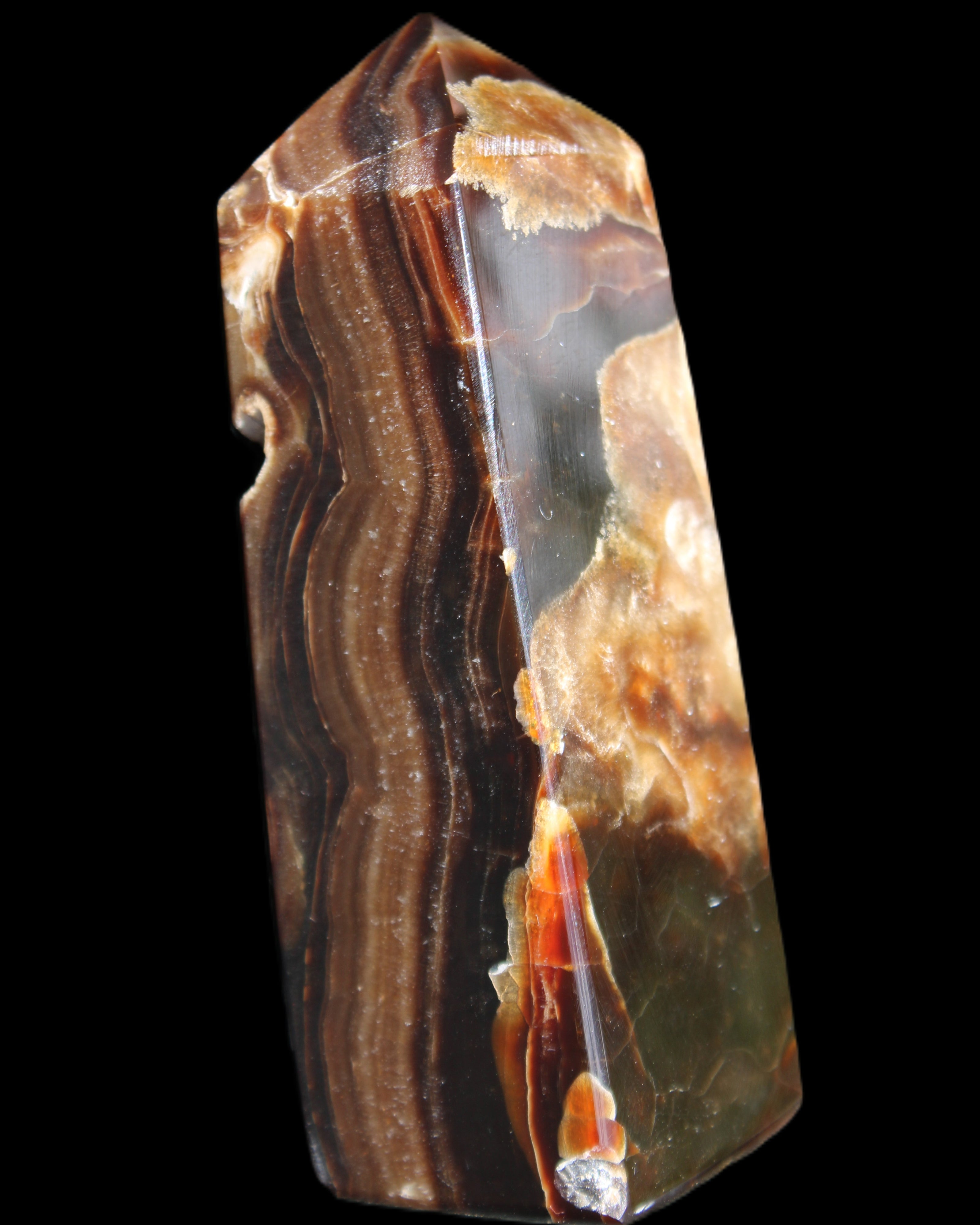 Chocolate Calcite obelisk 95*31*31mm 203g in sunlight - Rocks and Things Store