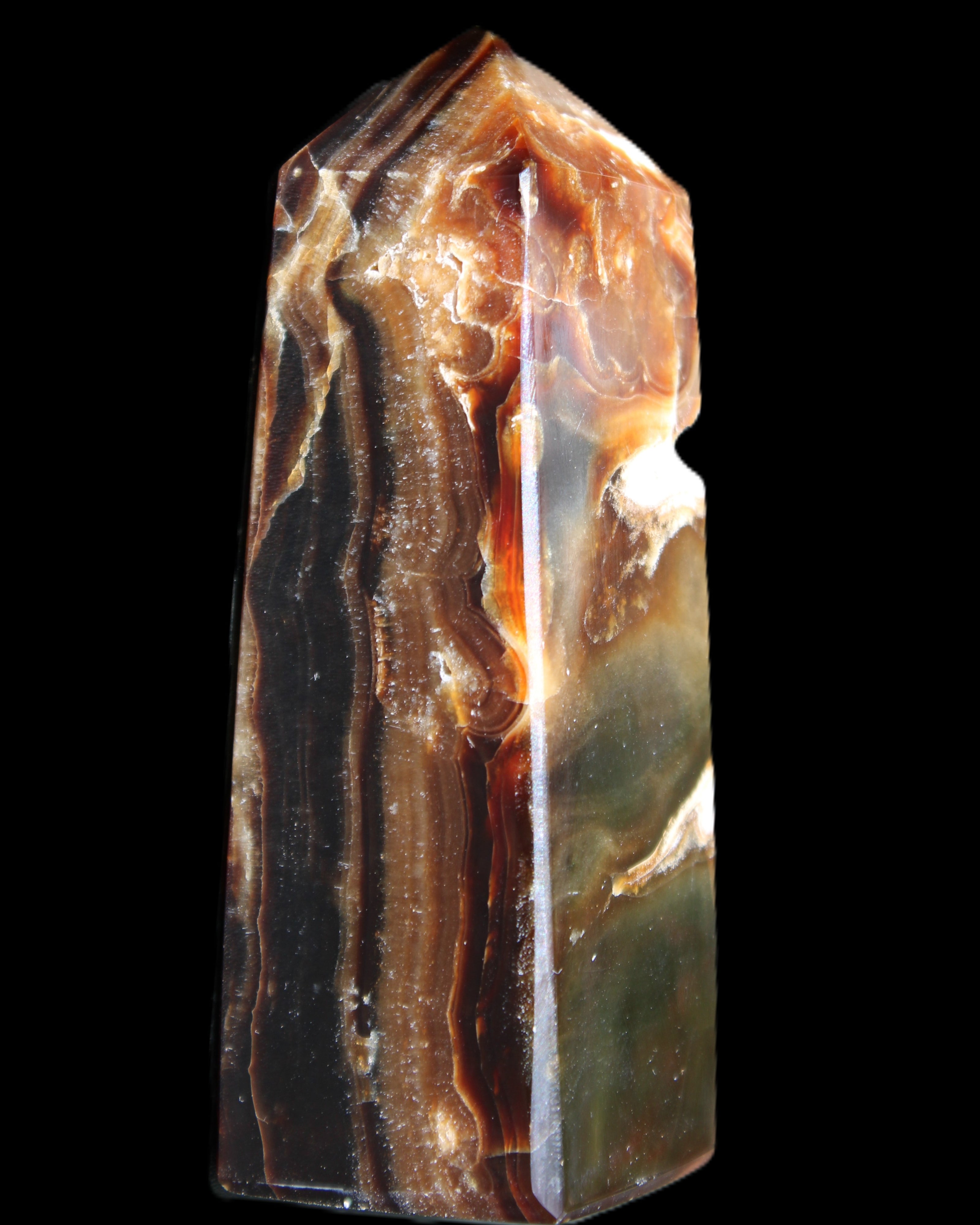 Chocolate Calcite obelisk 95*31*31mm 203g in sunlight - Rocks and Things Store