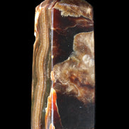 Chocolate Calcite obelisk 95*31*31mm 203g in sunlight - Rocks and Things Store