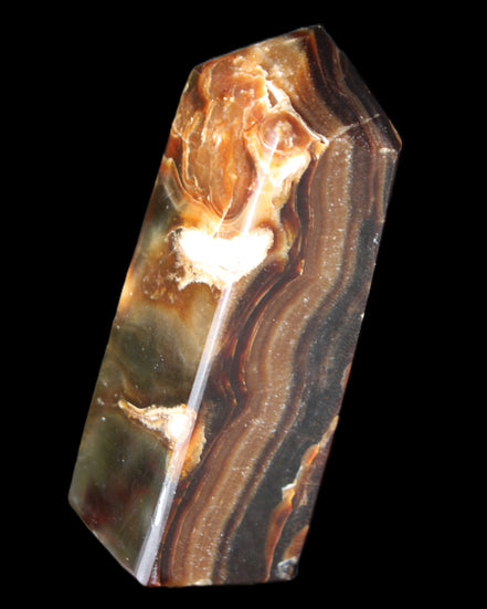 Chocolate Calcite obelisk 95*31*31mm 203g in sunlight - Rocks and Things Store