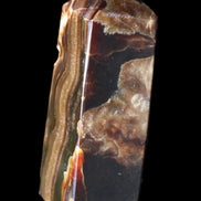 Chocolate Calcite obelisk 95*31*31mm 203g in sunlight - Rocks and Things Store
