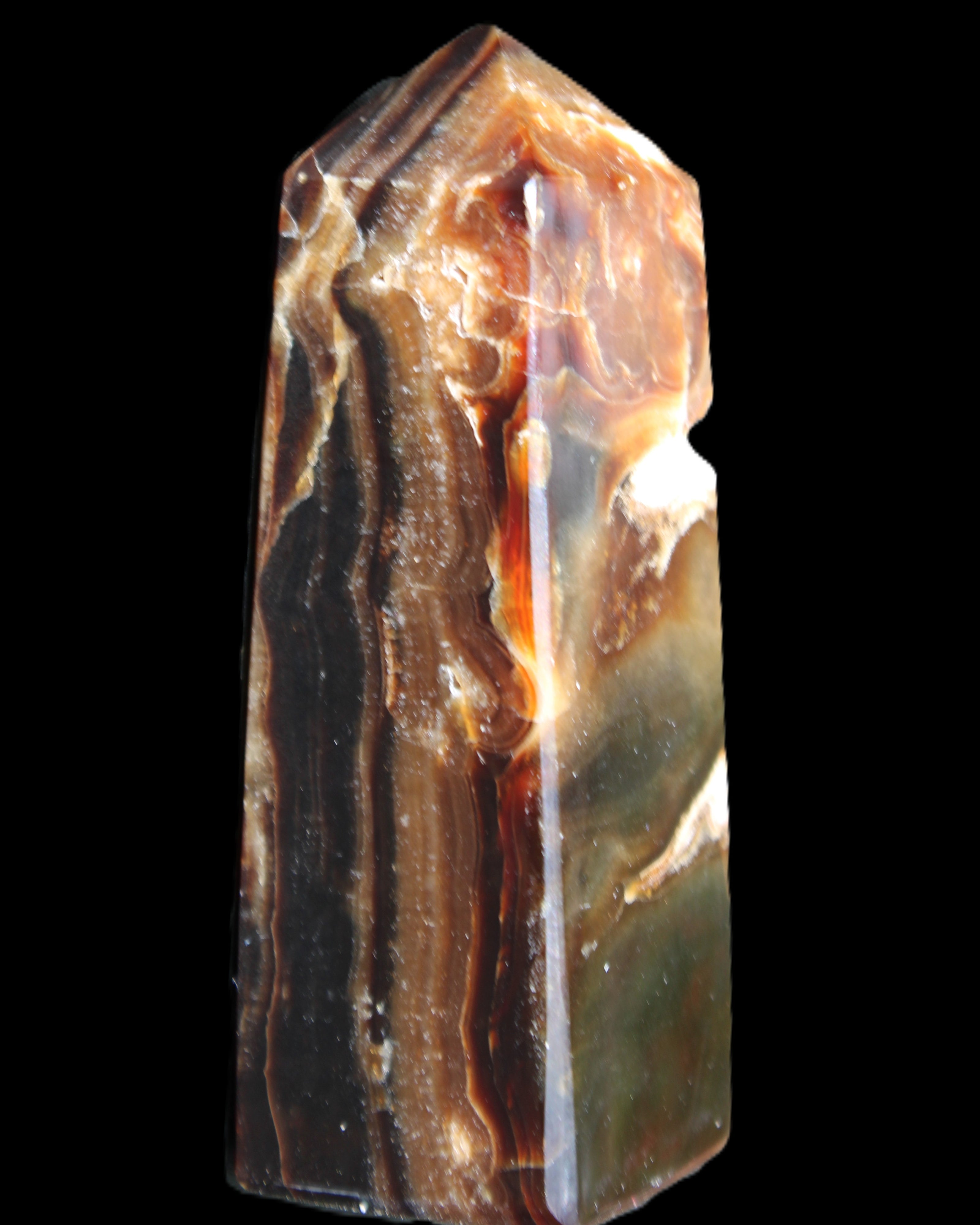 Chocolate Calcite obelisk 95*31*31mm 203g in sunlight - Rocks and Things Store