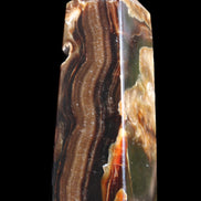 Chocolate Calcite obelisk 95*31*31mm 203g in sunlight - Rocks and Things Store