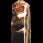 Chocolate Calcite obelisk 95*31*31mm 203g in sunlight - Rocks and Things Store