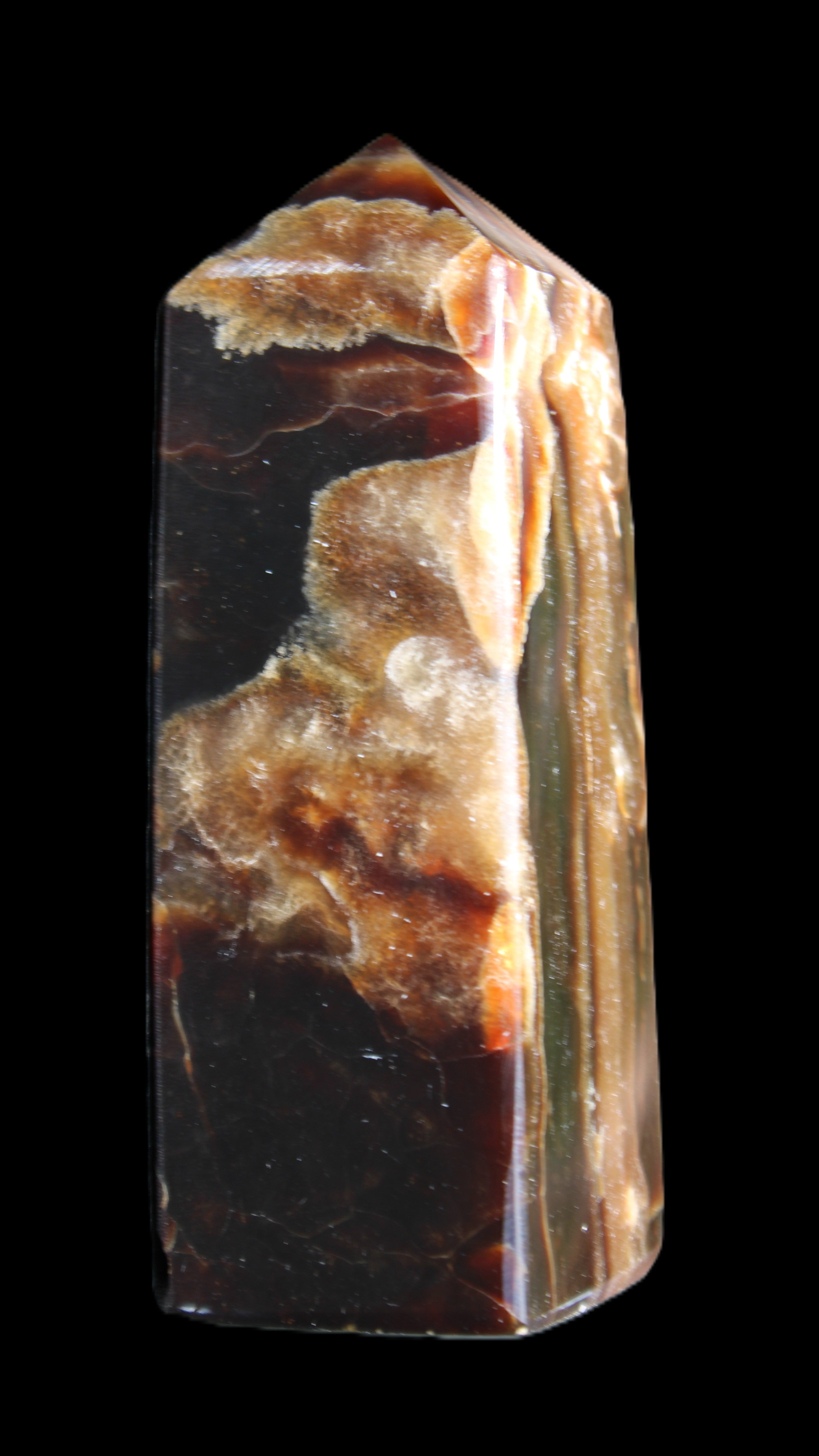 Chocolate Calcite obelisk 95*31*31mm 203g in sunlight - Rocks and Things Store
