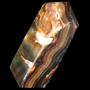 Chocolate Calcite obelisk 95*31*31mm 203g in sunlight - Rocks and Things Store