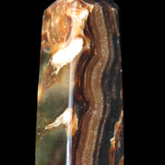 Chocolate Calcite obelisk 95*31*31mm 203g in sunlight - Rocks and Things Store