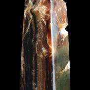 Chocolate Calcite obelisk 95*31*31mm 203g in sunlight - Rocks and Things Store