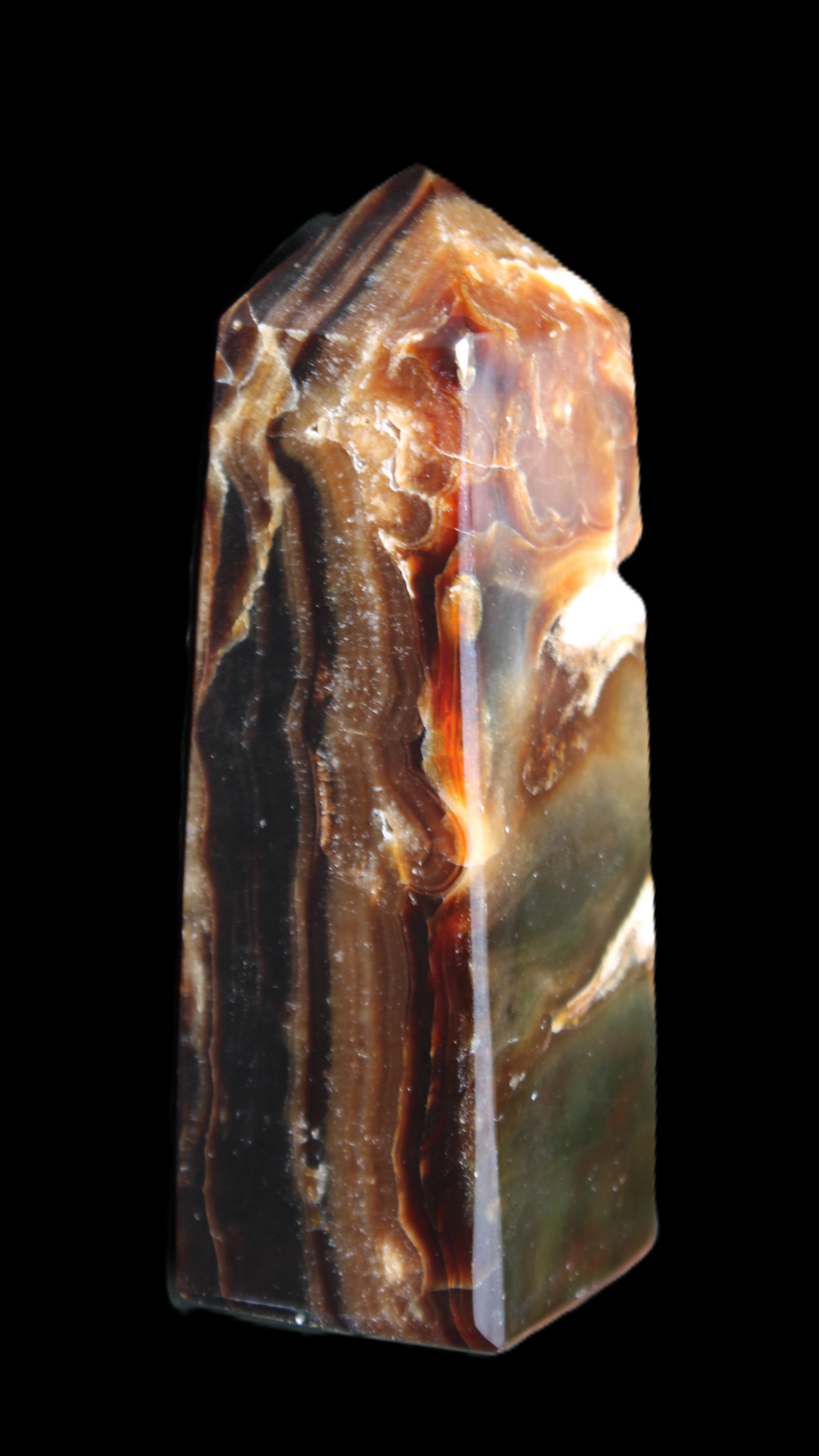 Chocolate Calcite obelisk 95*31*31mm 203g in sunlight - Rocks and Things Store