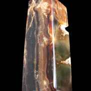 Chocolate Calcite obelisk 95*31*31mm 203g in sunlight - Rocks and Things Store
