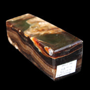 Chocolate Calcite obelisk 95*31*31mm 203g in sunlight - Rocks and Things Store