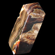 Chocolate Calcite obelisk 95*31*31mm 203g in sunlight - Rocks and Things Store