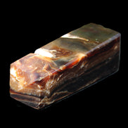 Chocolate Calcite obelisk 95*31*31mm 203g in sunlight - Rocks and Things Store