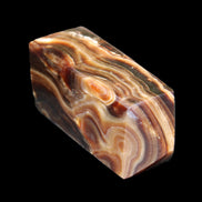 Chocolate Calcite obelisk 84*33*28mm 175g in sunlight - Rocks and Things Store