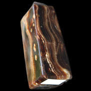 Chocolate Calcite obelisk 84*33*28mm 175g in sunlight - Rocks and Things Store