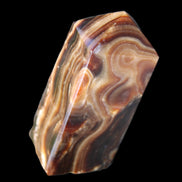 Chocolate Calcite obelisk 84*33*28mm 175g in sunlight - Rocks and Things Store