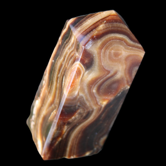 Chocolate Calcite obelisk 84*33*28mm 175g in sunlight - Rocks and Things Store