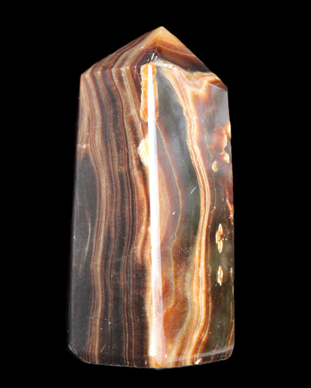 Chocolate Calcite obelisk 84*33*28mm 175g in sunlight - Rocks and Things Store