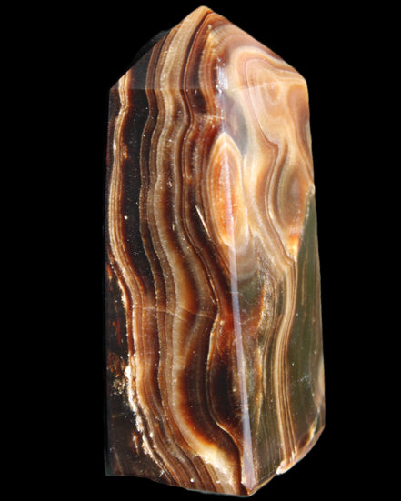 Chocolate Calcite obelisk 84*33*28mm 175g in sunlight - Rocks and Things Store