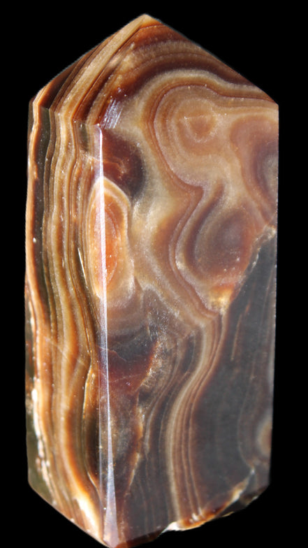 Chocolate Calcite obelisk 84*33*28mm 175g in sunlight - Rocks and Things Store