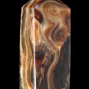 Chocolate Calcite obelisk 84*33*28mm 175g in sunlight - Rocks and Things Store