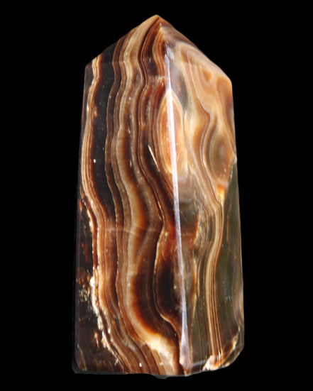 Chocolate Calcite obelisk 84*33*28mm 175g in sunlight - Rocks and Things Store