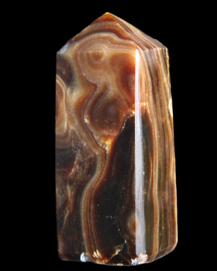 Chocolate Calcite obelisk 84*33*28mm 175g in sunlight - Rocks and Things Store