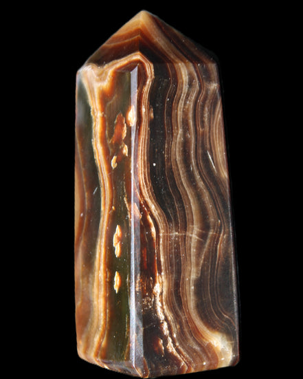 Chocolate Calcite obelisk 84*33*28mm 175g in sunlight - Rocks and Things Store