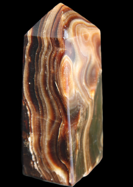 Chocolate Calcite obelisk 84*33*28mm 175g in sunlight - Rocks and Things Store