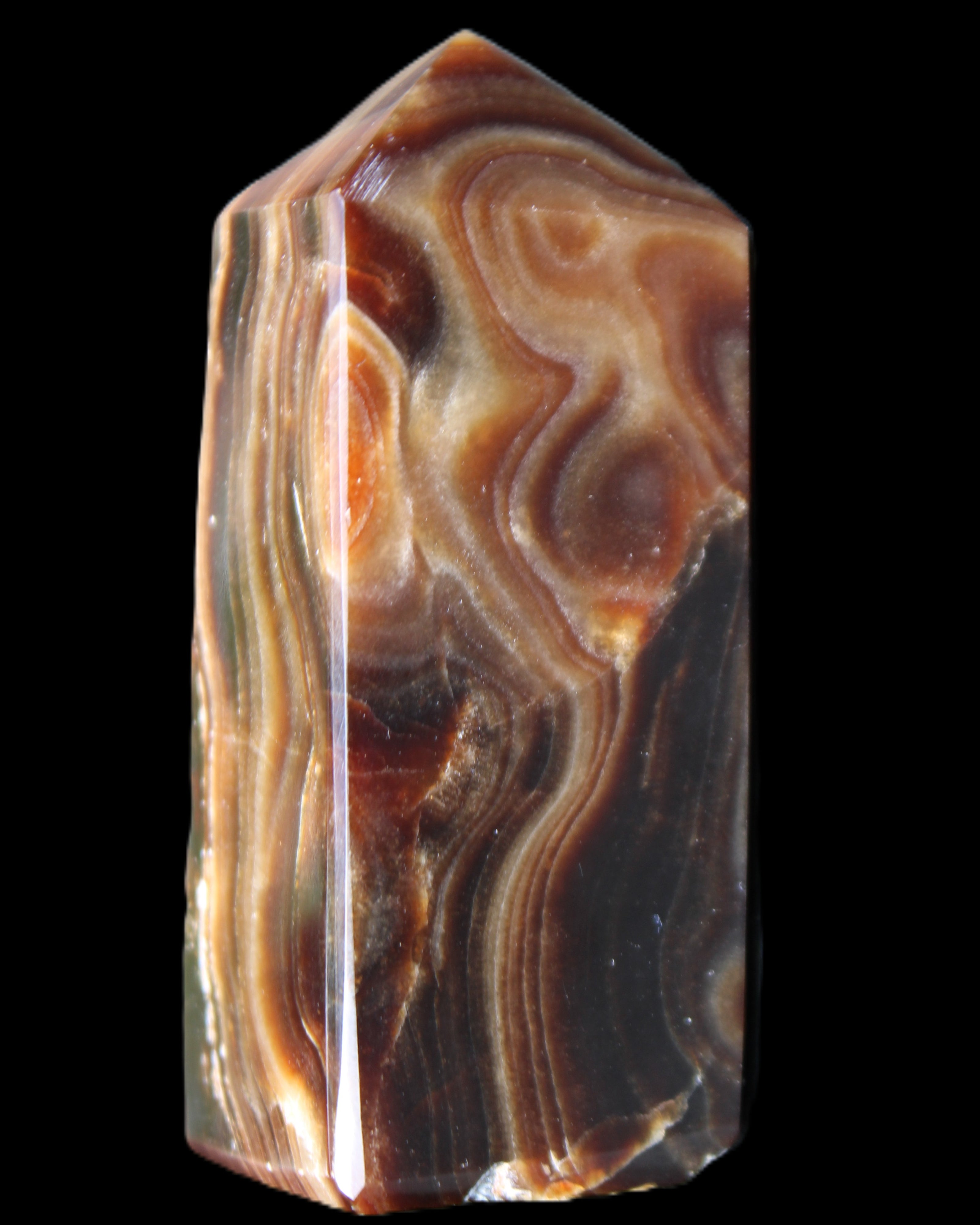 Chocolate Calcite obelisk 84*33*28mm 175g in sunlight - Rocks and Things Store