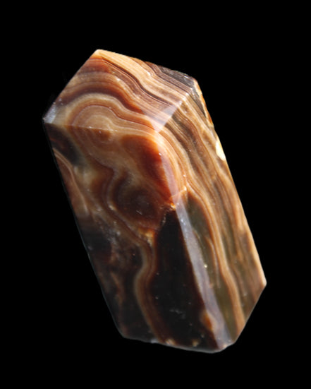 Chocolate Calcite obelisk 84*33*28mm 175g in sunlight - Rocks and Things Store