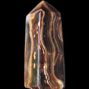 Chocolate Calcite obelisk 84*33*28mm 175g in sunlight - Rocks and Things Store