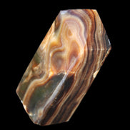 Chocolate Calcite obelisk 84*33*28mm 175g in sunlight - Rocks and Things Store