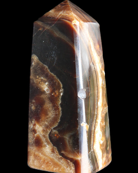 Chocolate Calcite obelisk 78*31*28mm 145g in sunlight - Rocks and Things Store