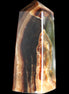 Chocolate Calcite obelisk 78*31*28mm 145g in sunlight - Rocks and Things Store