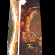 Chocolate Calcite obelisk 78*31*28mm 145g in sunlight - Rocks and Things Store