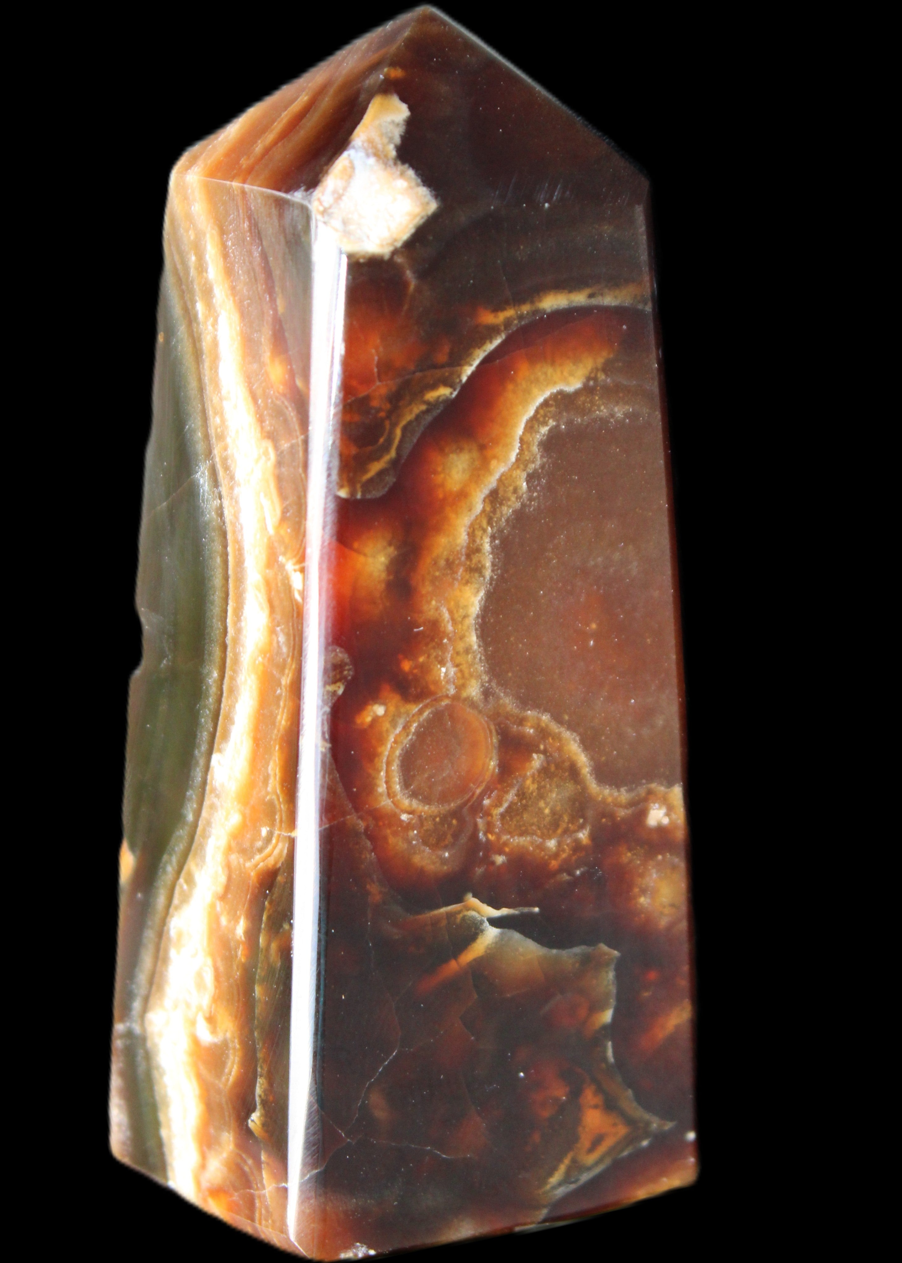 Chocolate Calcite obelisk 78*31*28mm 145g in sunlight - Rocks and Things Store