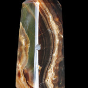 Chocolate Calcite obelisk 78*31*28mm 145g in sunlight - Rocks and Things Store