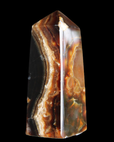 Chocolate Calcite obelisk 78*31*28mm 145g in sunlight - Rocks and Things Store